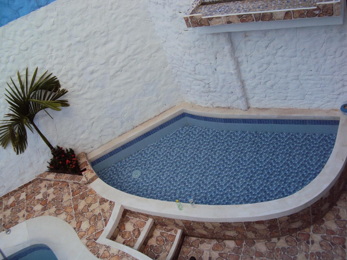 Hotel Plaza Confort Girardot Bagian luar foto